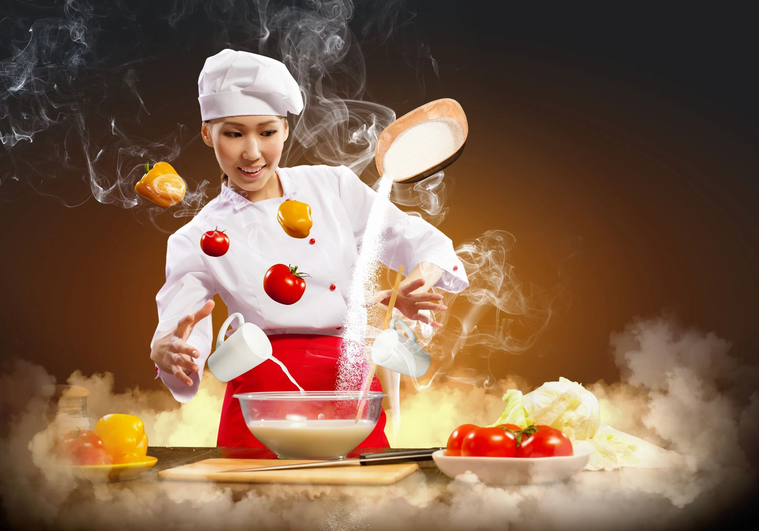 17428547 - asian female cooking with magic against color background