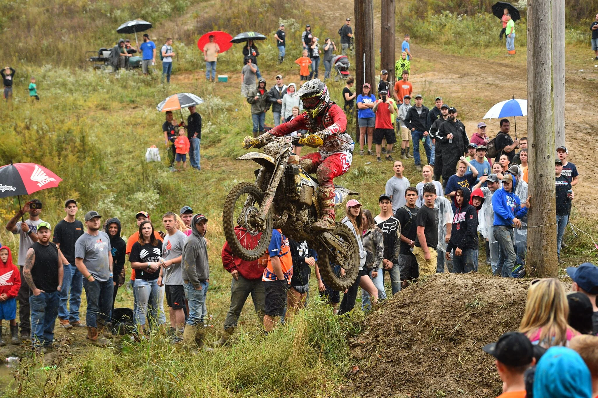 Hunter Neuwirth takes on the infamous creek jump at the Powerline Park GNCC. - Photo - Ken Hill