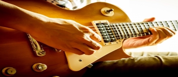 Man-Playing-Electric-Guitar.jpg