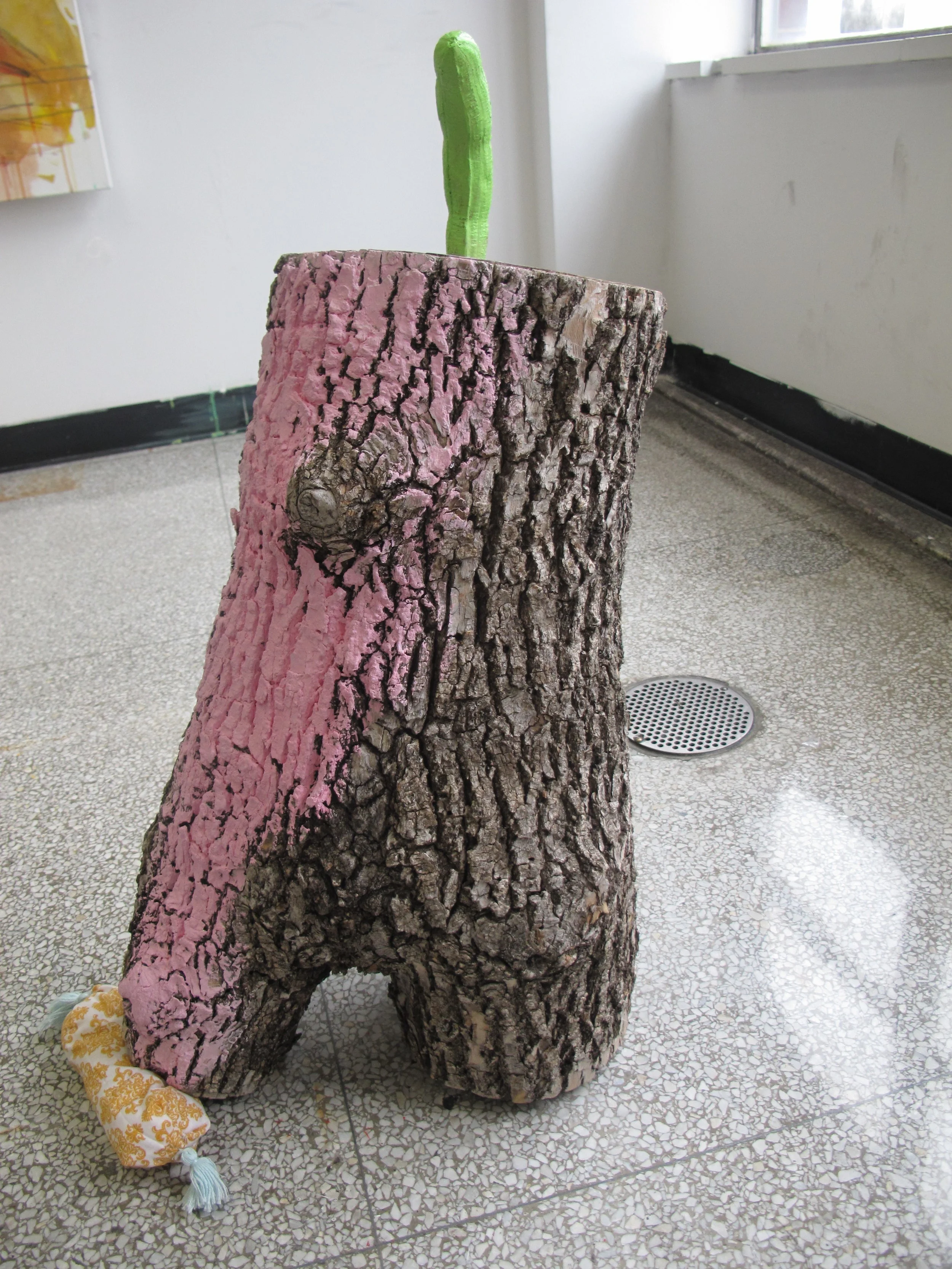 De Abajo, 2018, acrylic, wood log, plaster banana , and fabric