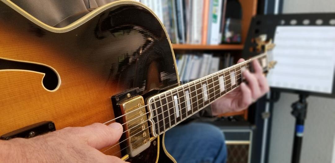 Guitar and music stand shot.jpg