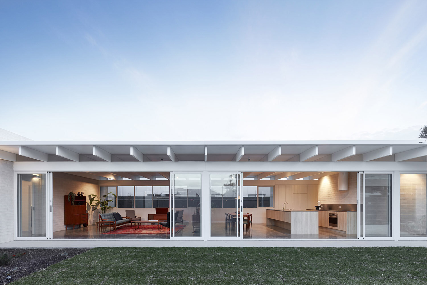 brick-concrete-contemporary-midcentury-exterior-KB-house.jpg