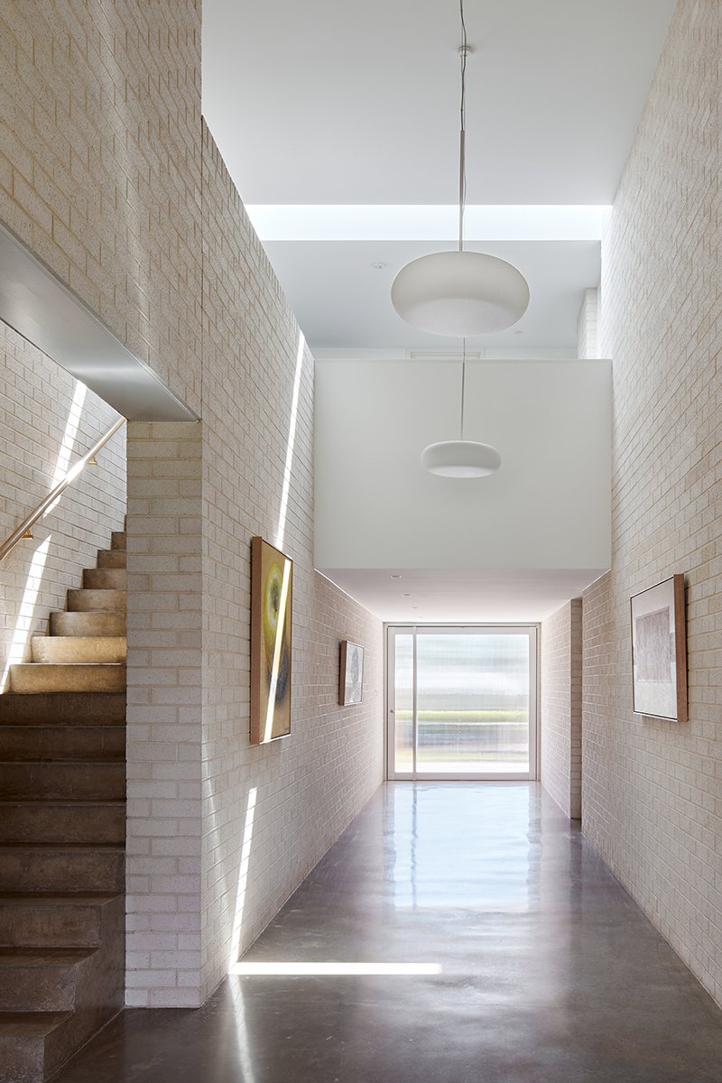 Jacaranda-House-Brick-Contemporary-Masonry-Hallway.jpg