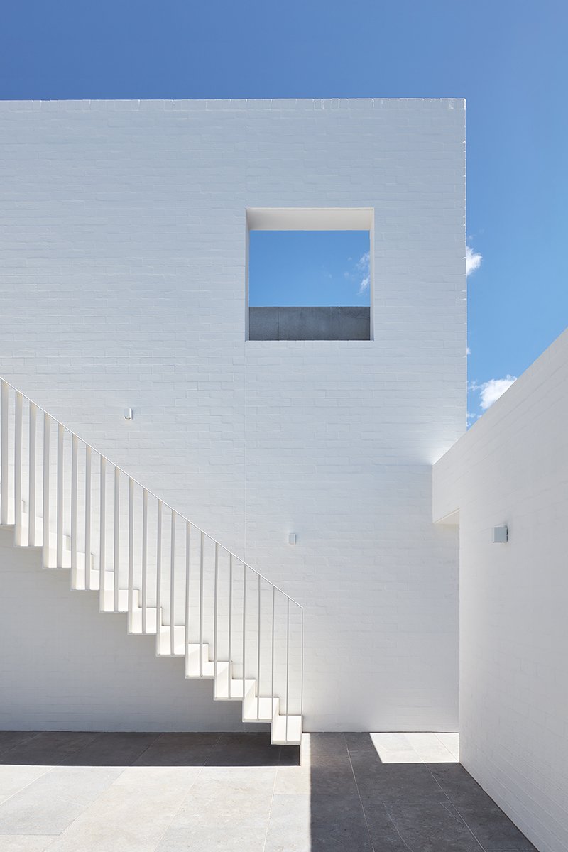 Frangipani-House-Contemporary-Modernist-Brick-Home-Stair-Sky.jpeg