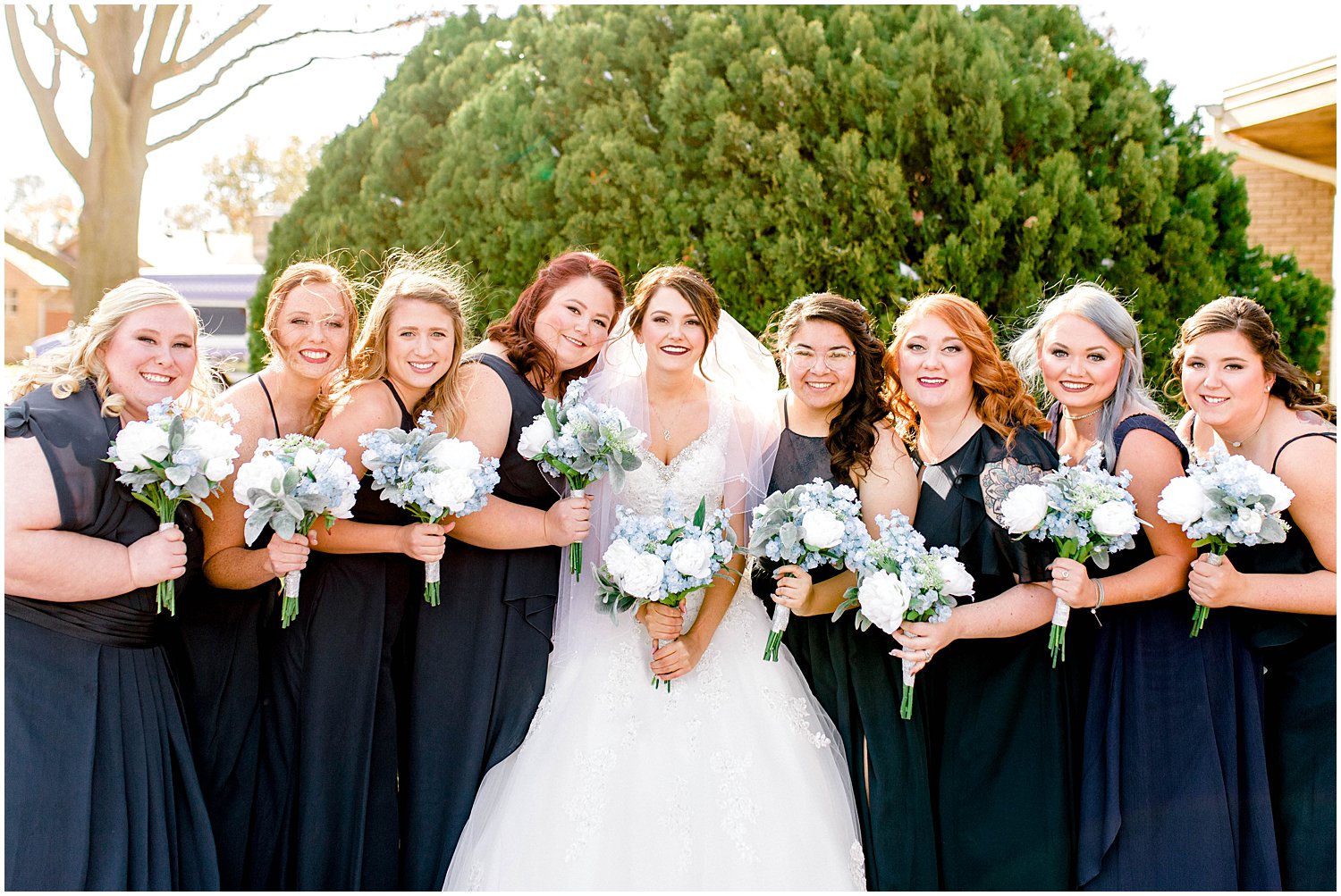 Hutchinson Kansas Wedding, Kansas Wedding Photographer, Wichita Wedding Photographer, church wedding, traditional wedding, catholic wedding, themed wedding, wedding photography, wedding inspiration, unique wedding photos, large wedding party, large wedding party posing inspiration