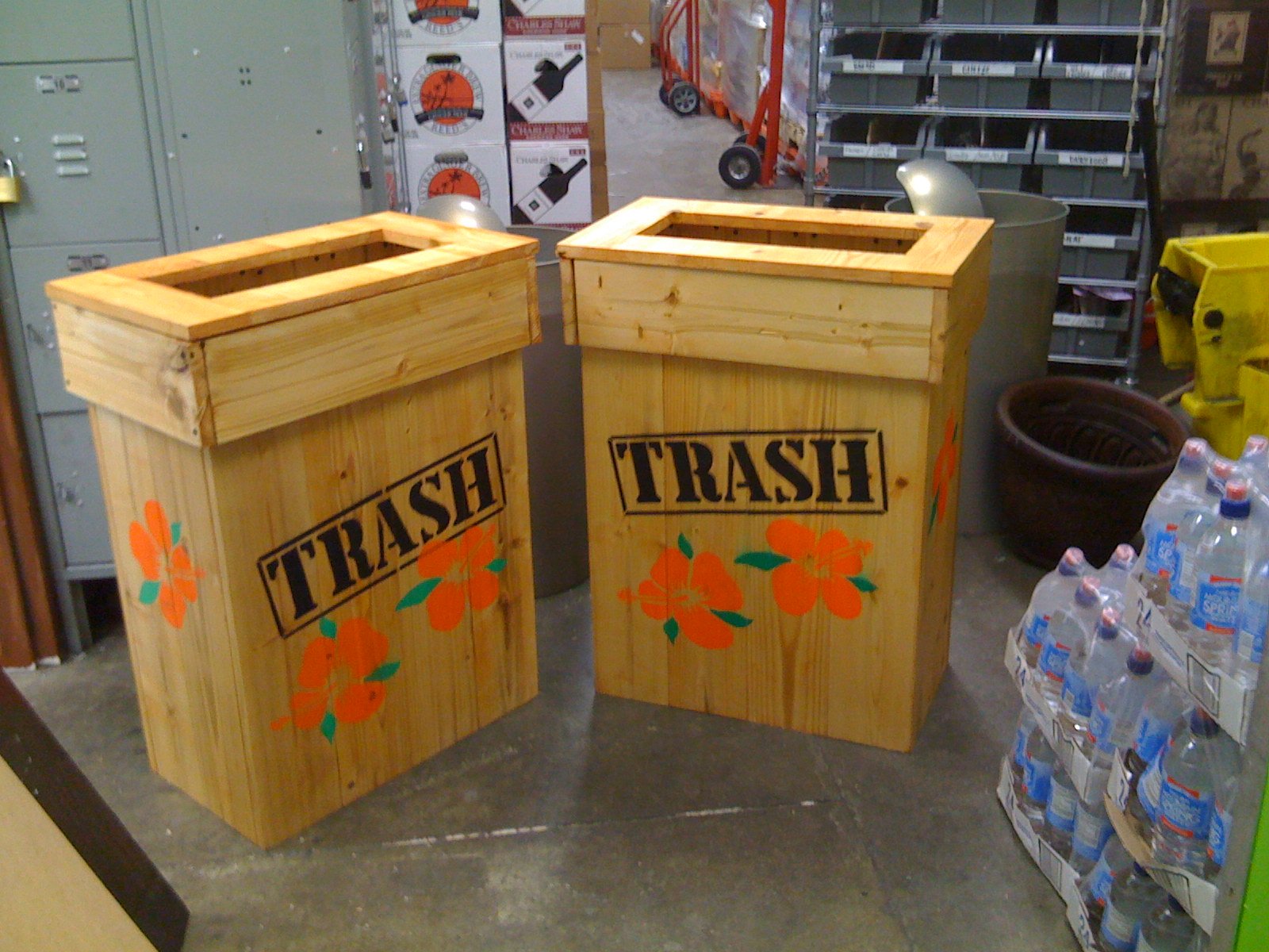  Our store had these ugly plastic trash cans so I made 8 of these wooden containers to hide them. Near daily trips to Home Depot were definitely a perk of the job. 