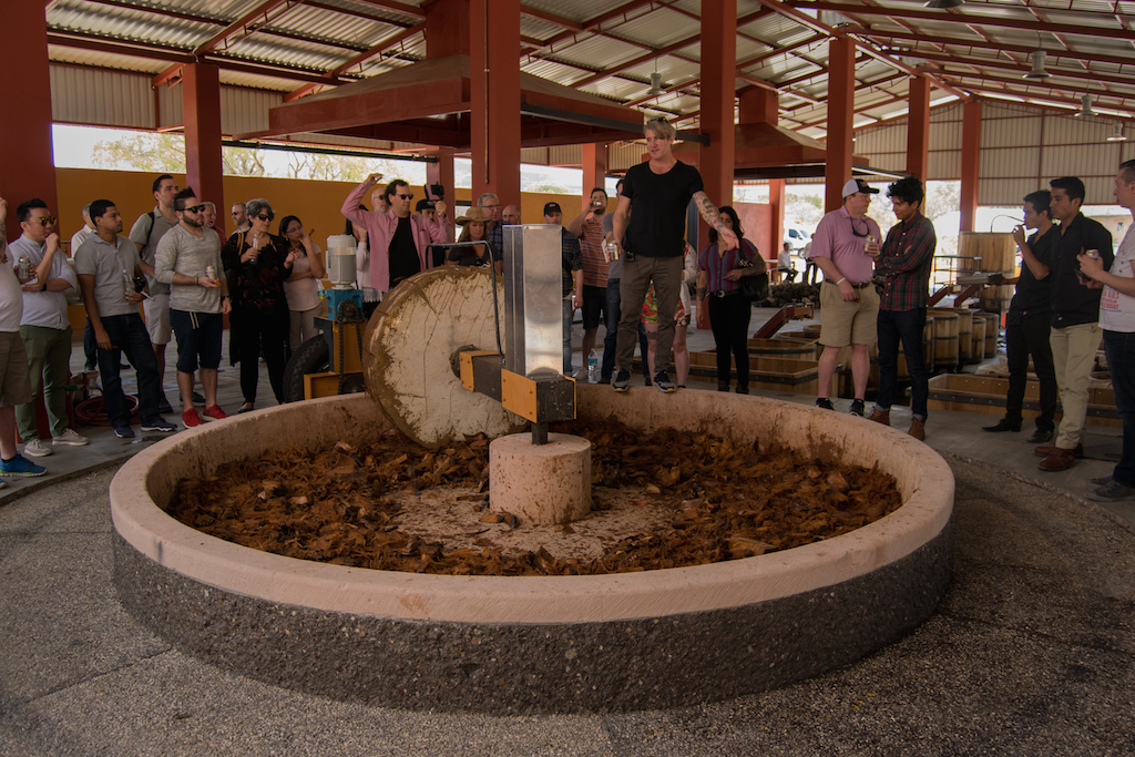 Richard Betts explaining the milling process to Davos Brands' team. Photography: Karen Cuevas