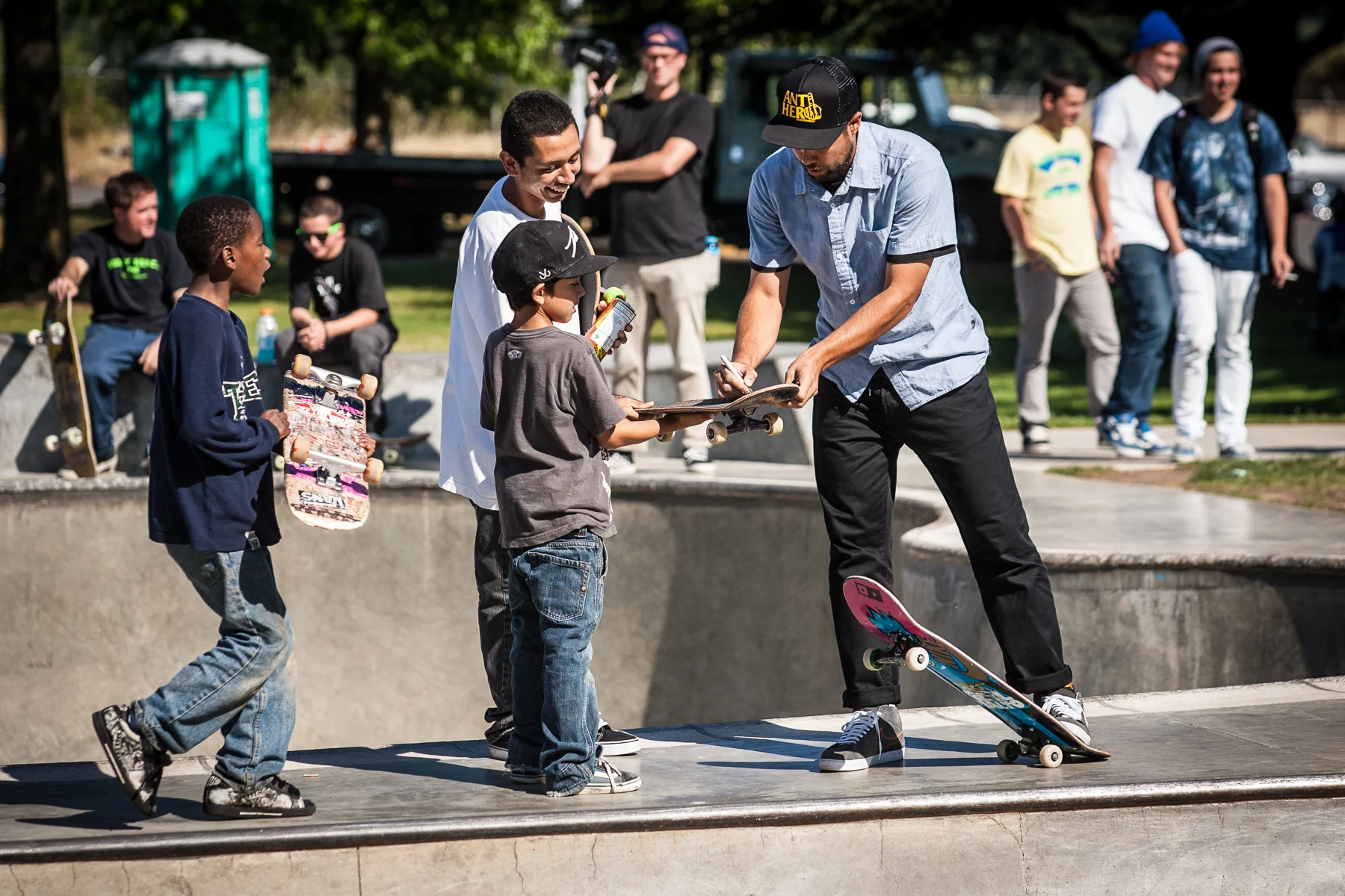 Pro skater Eric Koston offers up his autograph to the next generation of skaters at Glenhaven Skatepark.