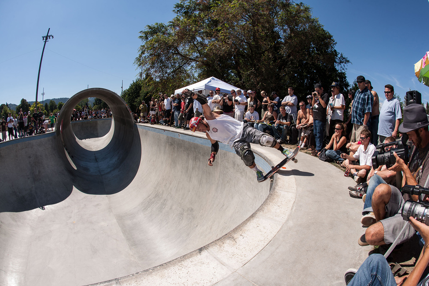  Veteran pro skateboarder Steve Alba boardslides through the corner of Pier Park Skatepark during the annual Oregon Trifecta competition. 