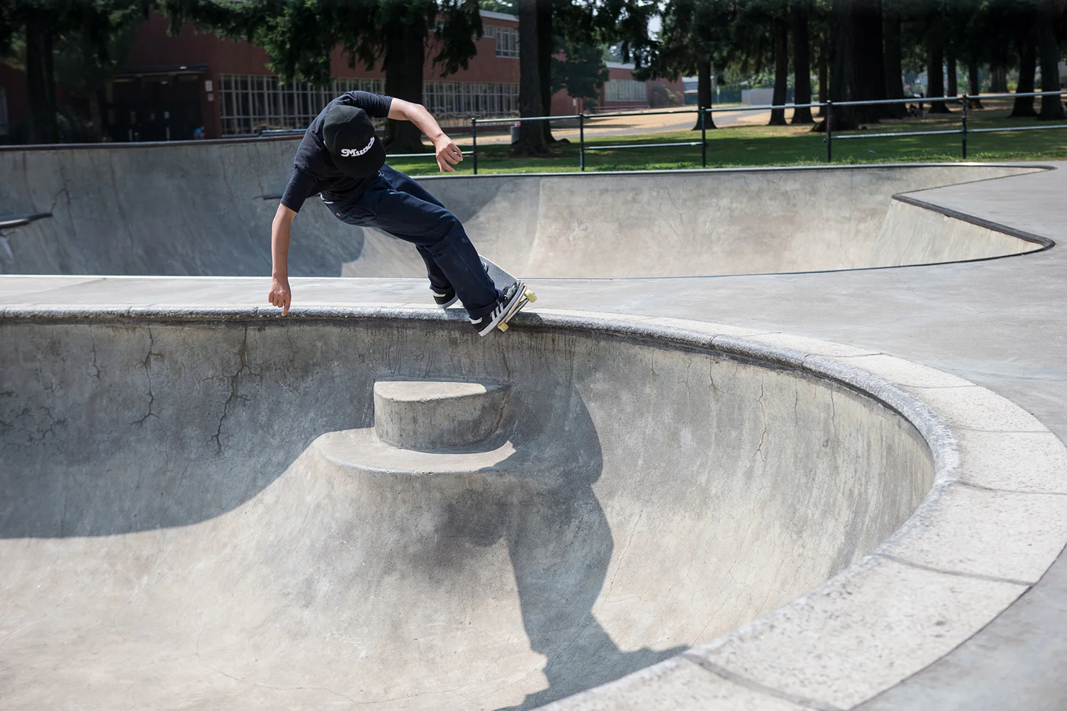 Visiting from Japan, Souta Tomikawa enjoys the authentic pool coping of the Peanut Bowl at Glenhaven Skatepark.