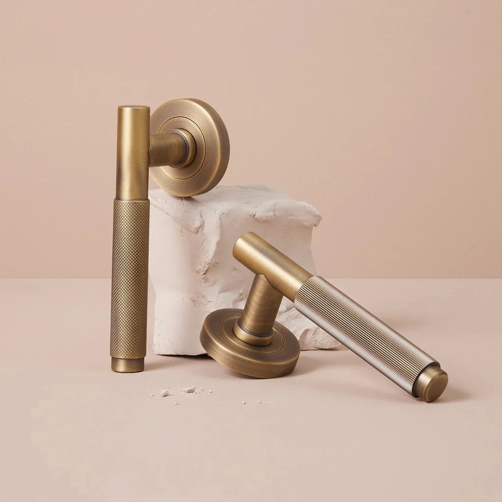 lo-and-co-interiors-door-levers-aged-brass-nat-turnball_1024x1024.jpg