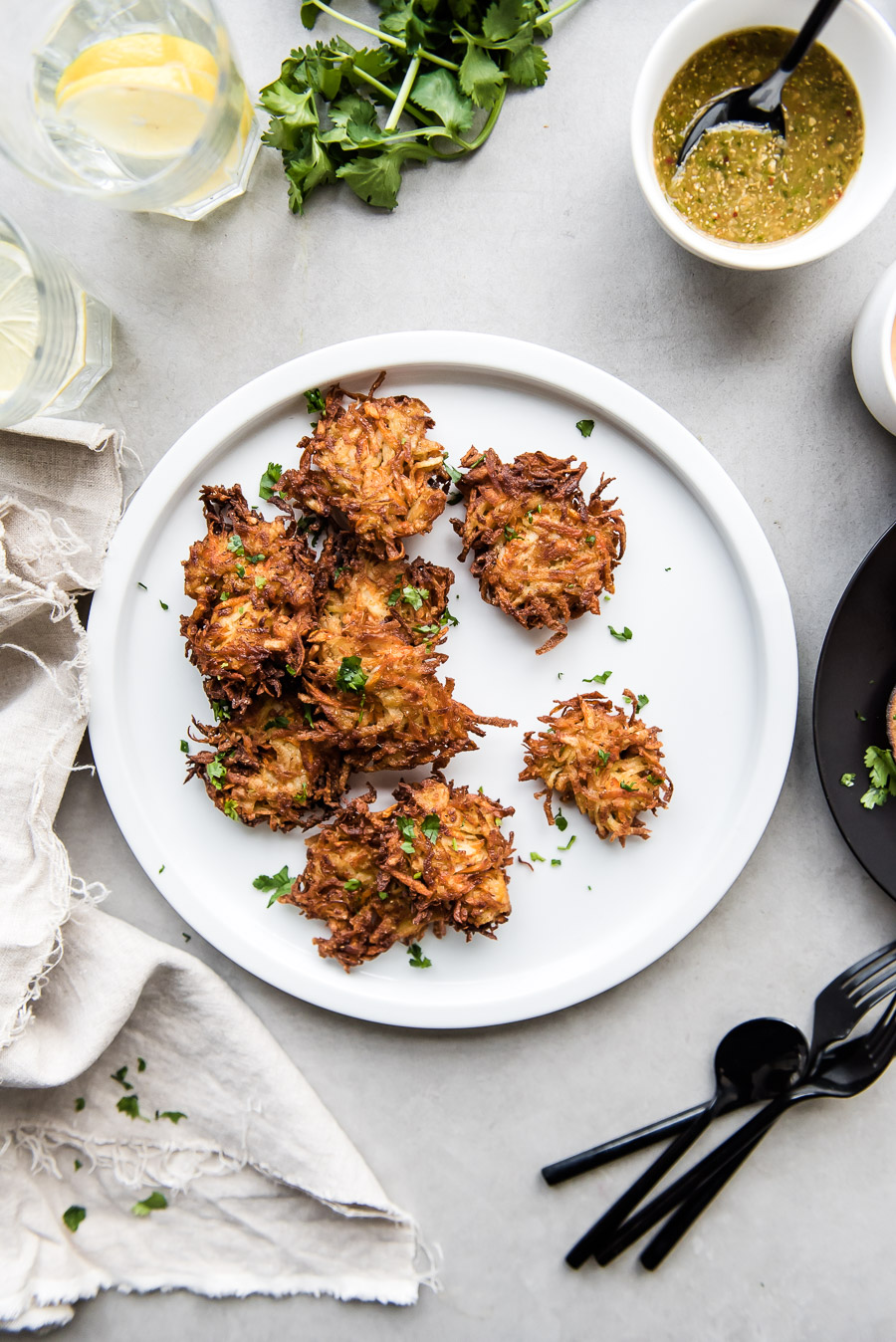 Carrot Latkes with Fried Eggplant and Harissa Tahini Drizzle - Gather A Table