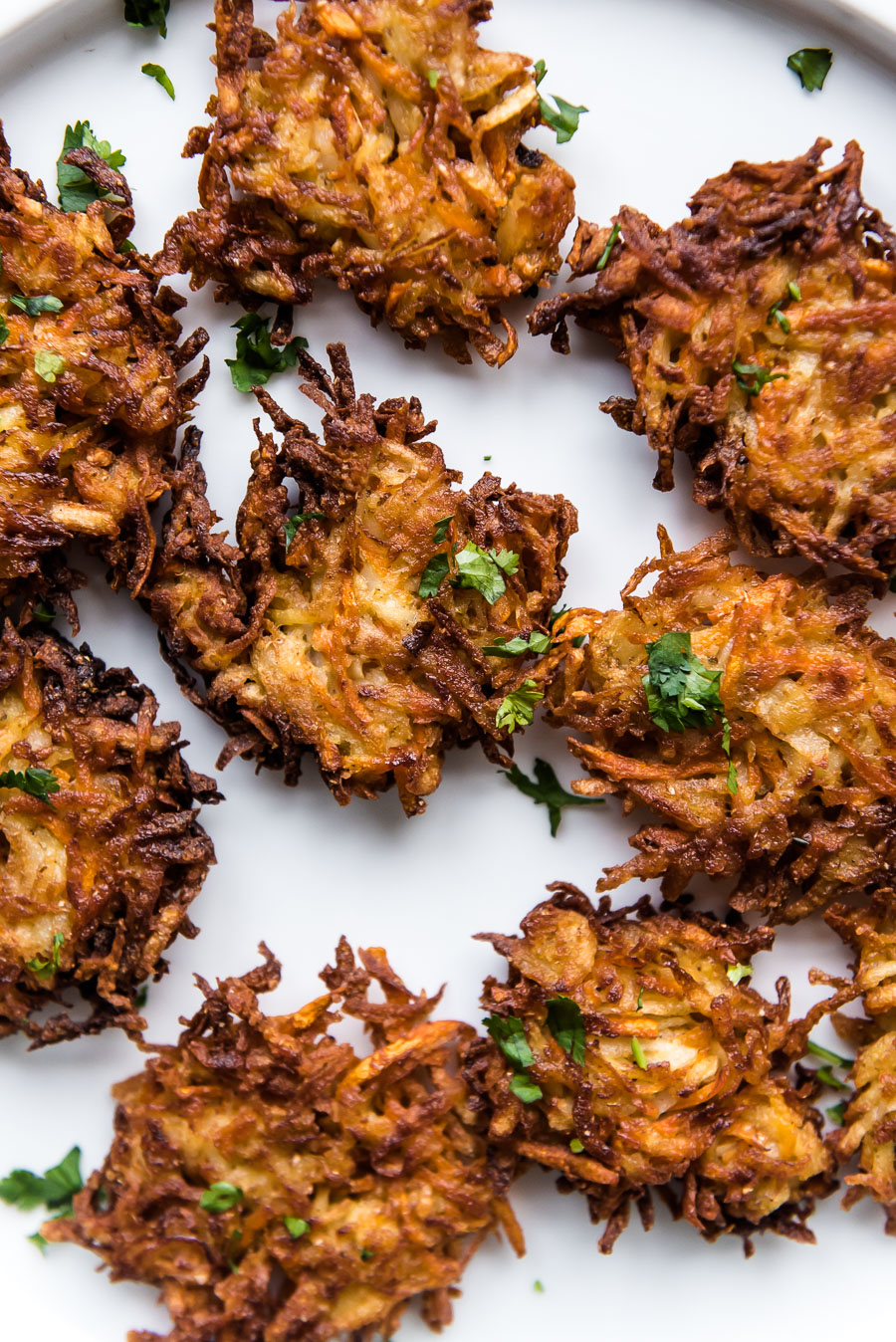 Carrot Latkes with Fried Eggplant and Harissa Tahini Drizzle - Gather A Table