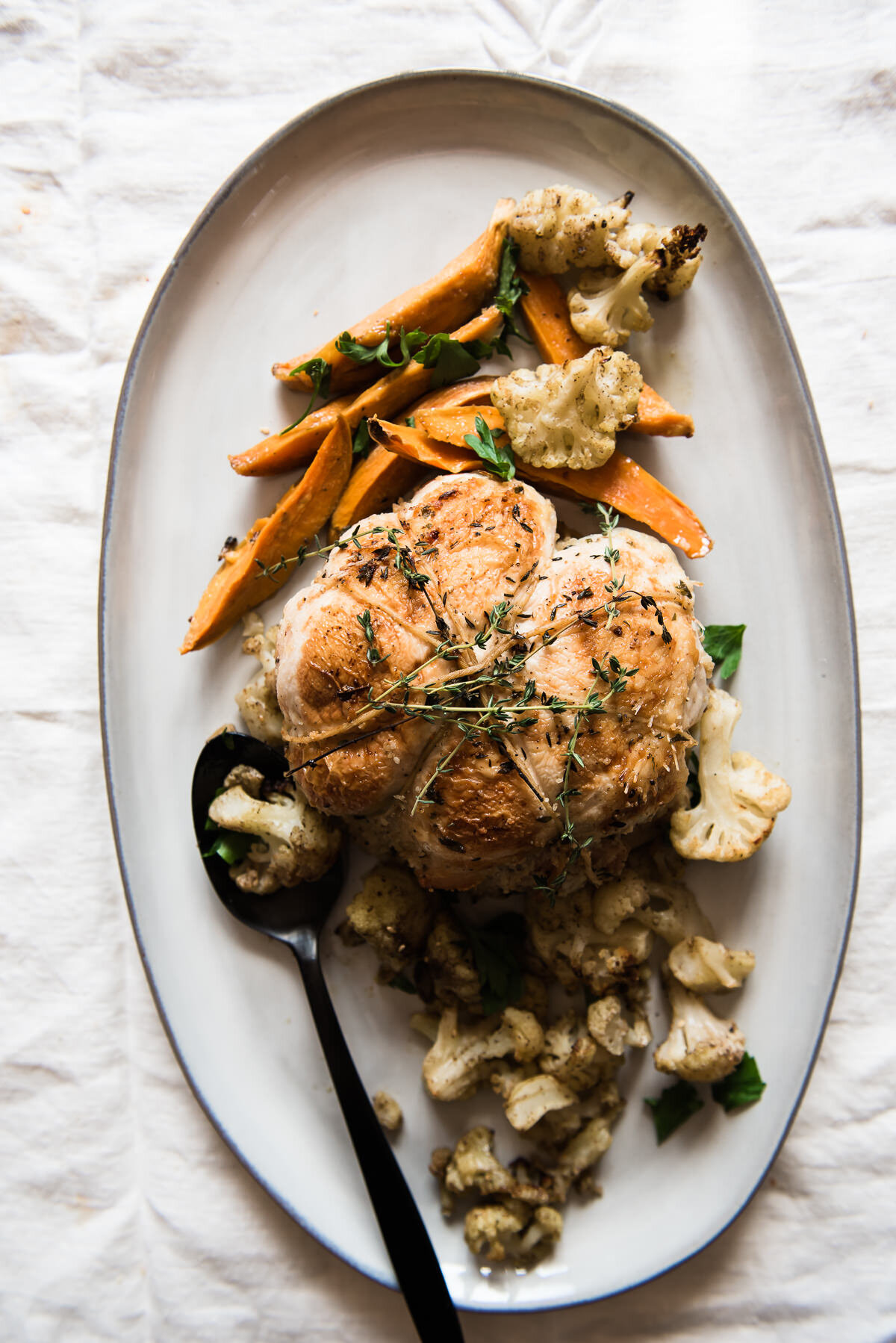 Couscous stuffed Chicken Cushion with Roasted Vegetables and Avocado Cherry Salad | Gather a Table