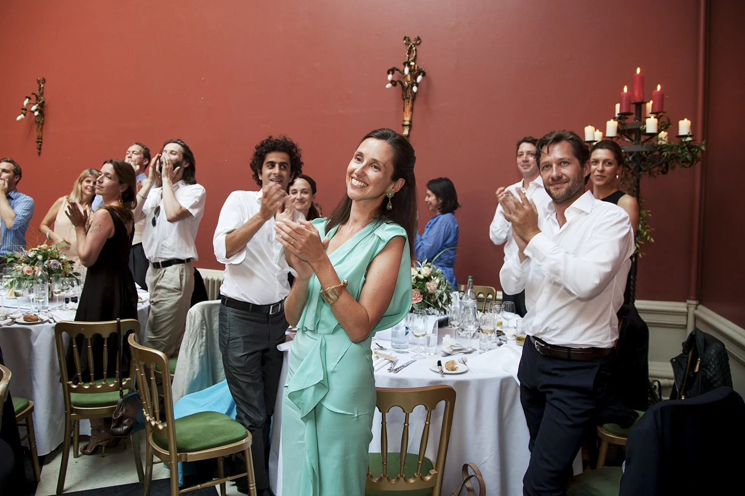 wedding guests clapping the speeches