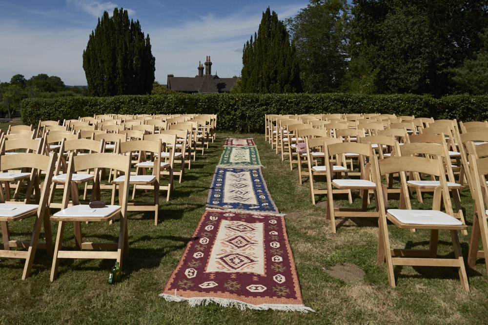 DIY wedding aisle with Persian rugs 