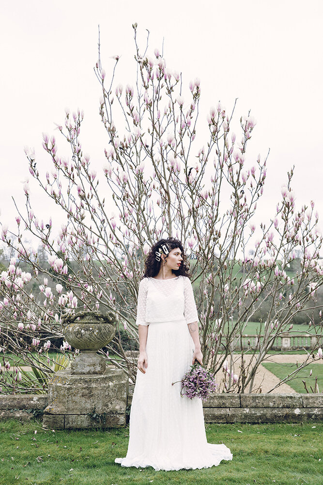 Bridal portrait against magnolia tree at Orchardleigh Estate 