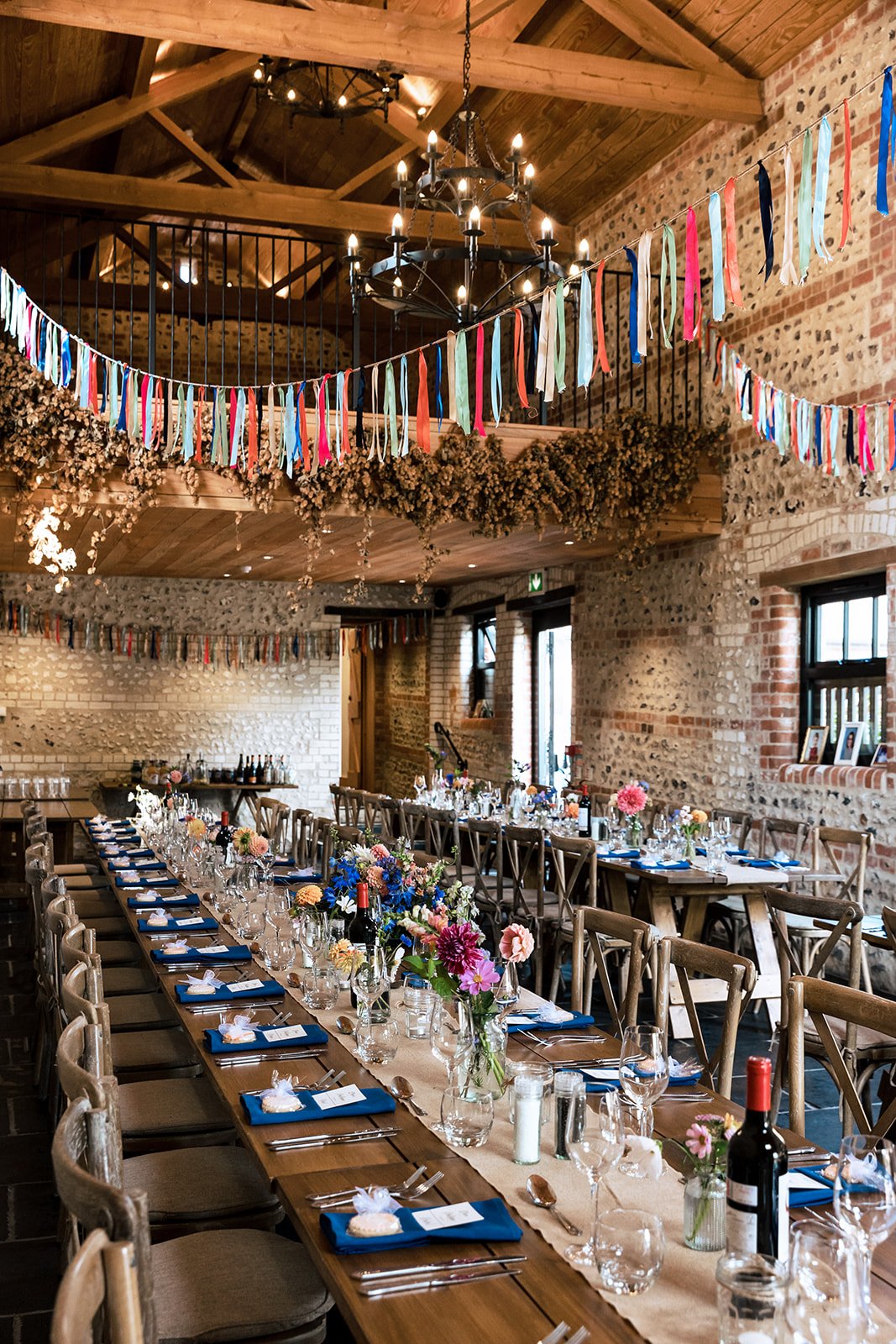 Rustic barn decorated and set up for a wedding breakfast