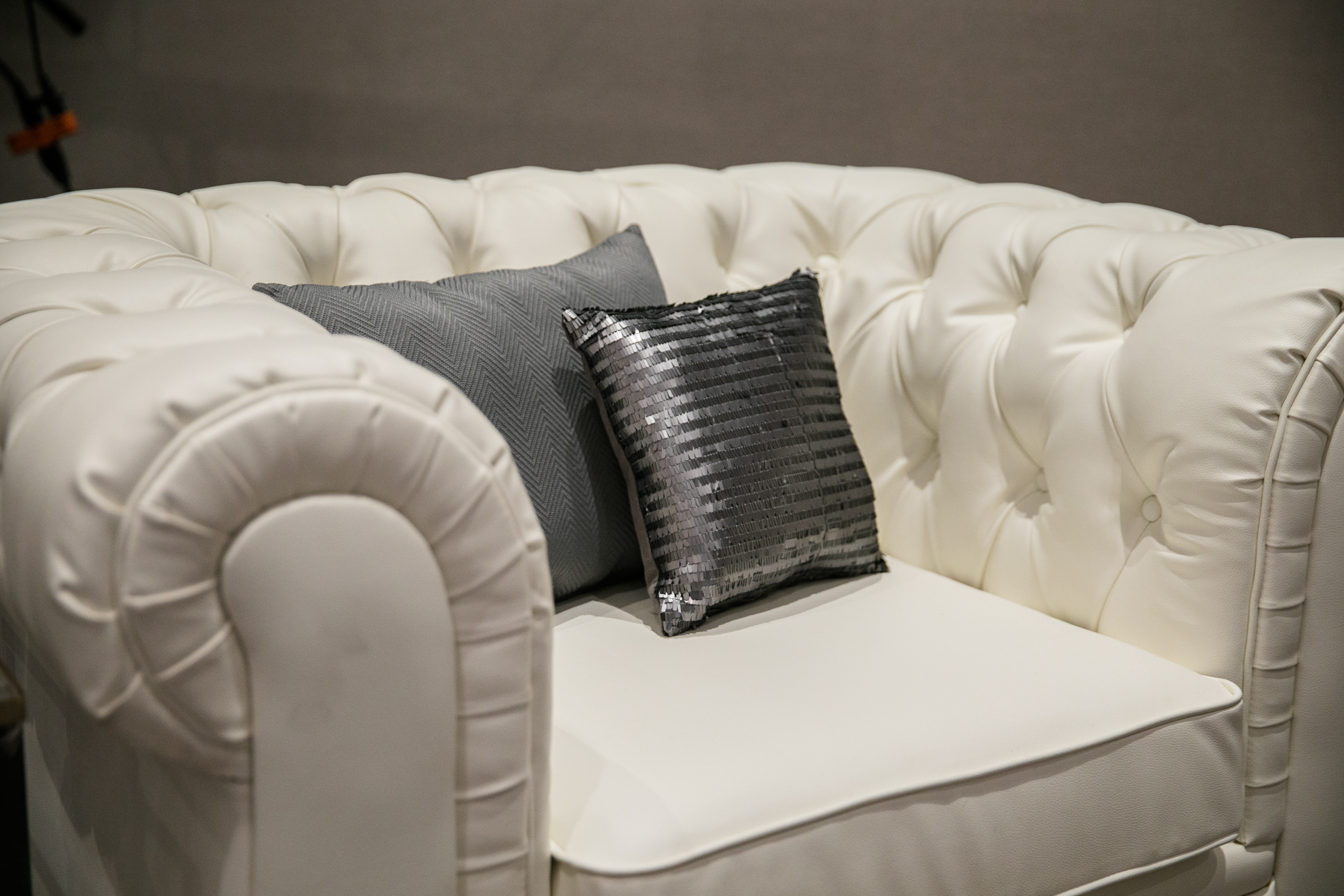 Malloy Weddings | New England wedding furniture rentals | White tufted leather chair wedding furniture rentals