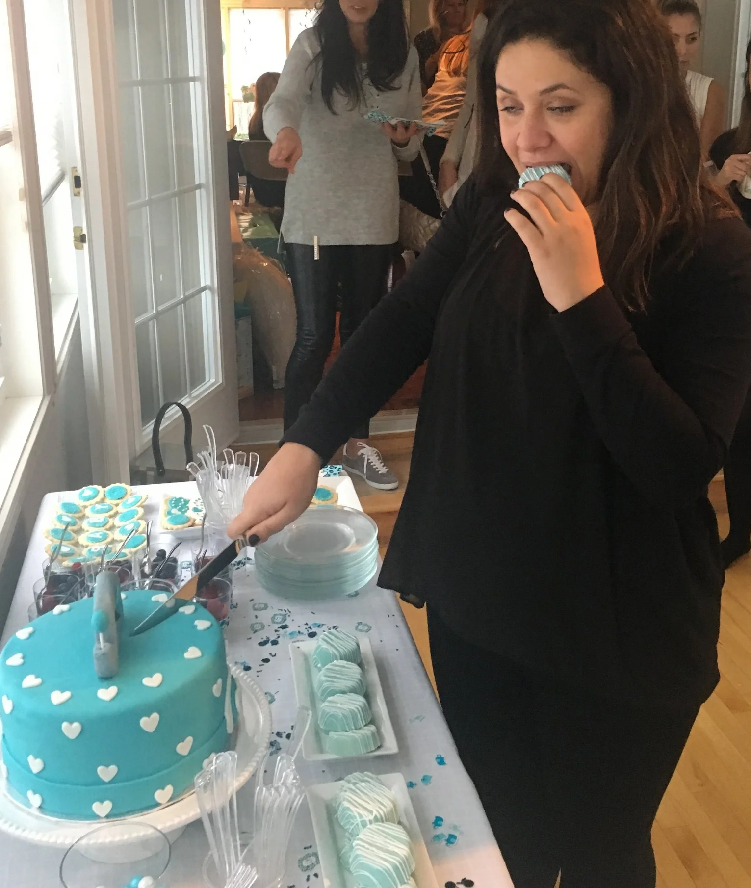 This is me at my baby shower and it accurately depicts my entire pregnancy - eat to survive. #IWasOverIt. But also, how good are chocolate covered oreos!?