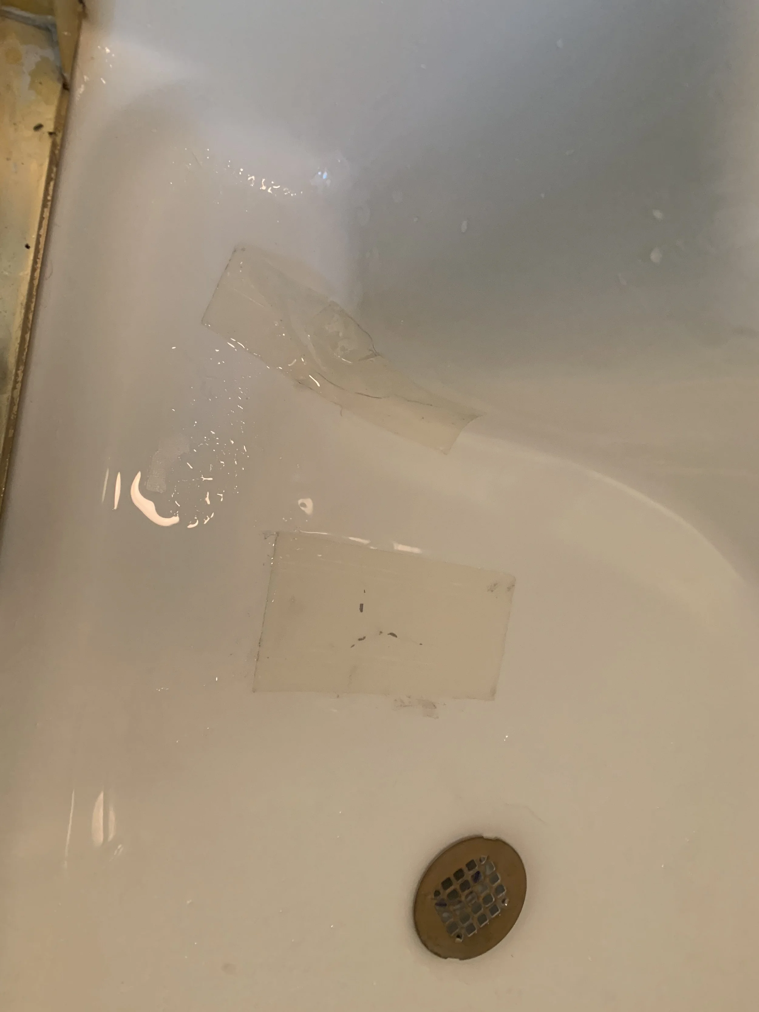 Cracked shower floor.JPG