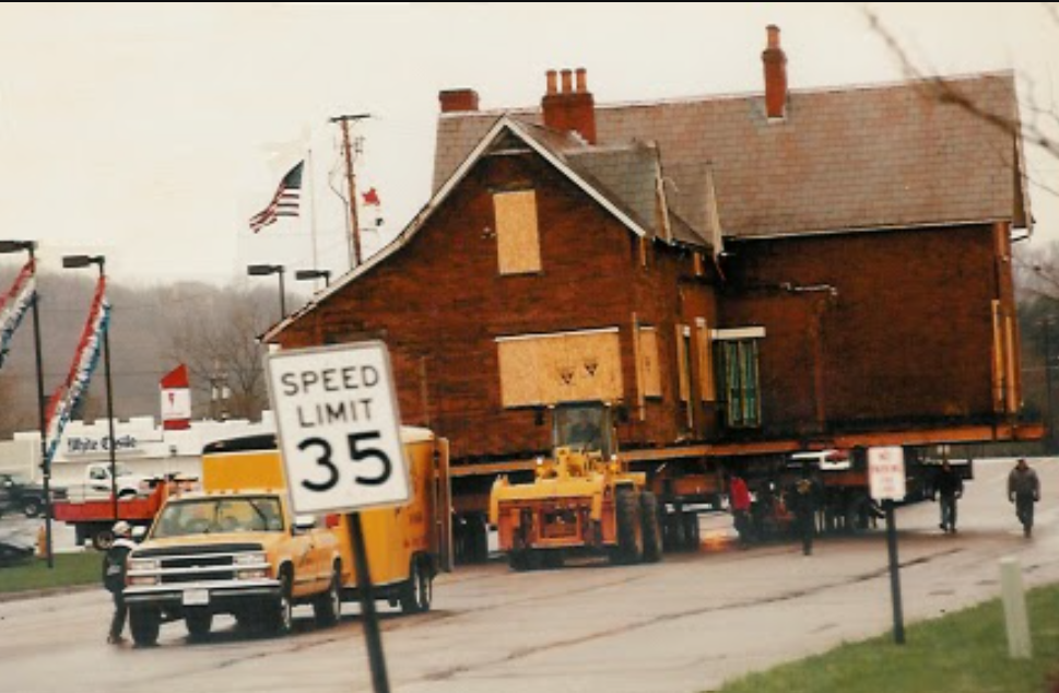 The Davis-Shai House being driven down Rt 79 in Heath, Ohio to preserve the historic house. It was moved from 901 Hebron Rd to 301 Central Pkwy in April of 1996.