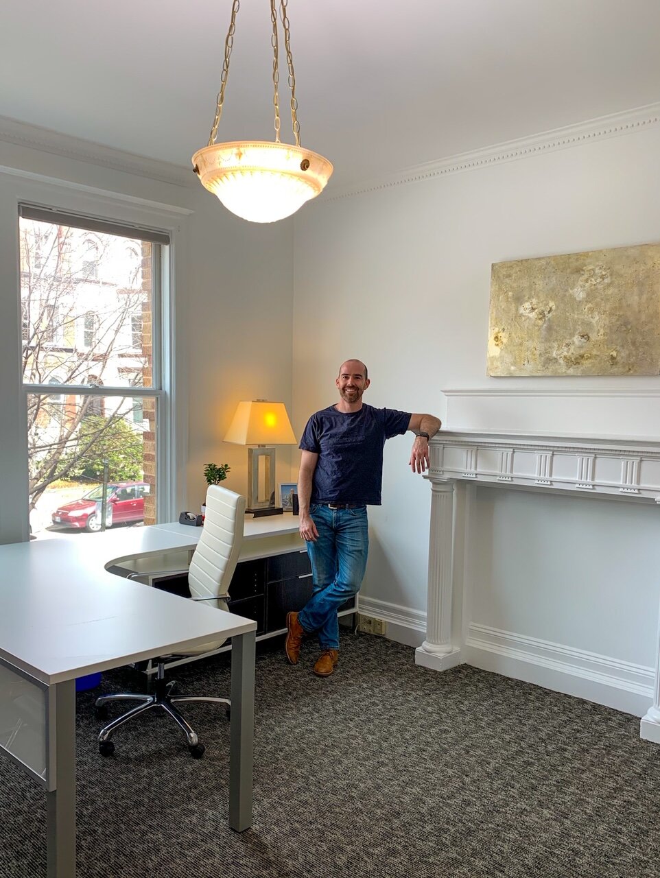 Own Ben Stern standing in corner Buyer's Edge Dupont DC buyers agent real estate office.JPG