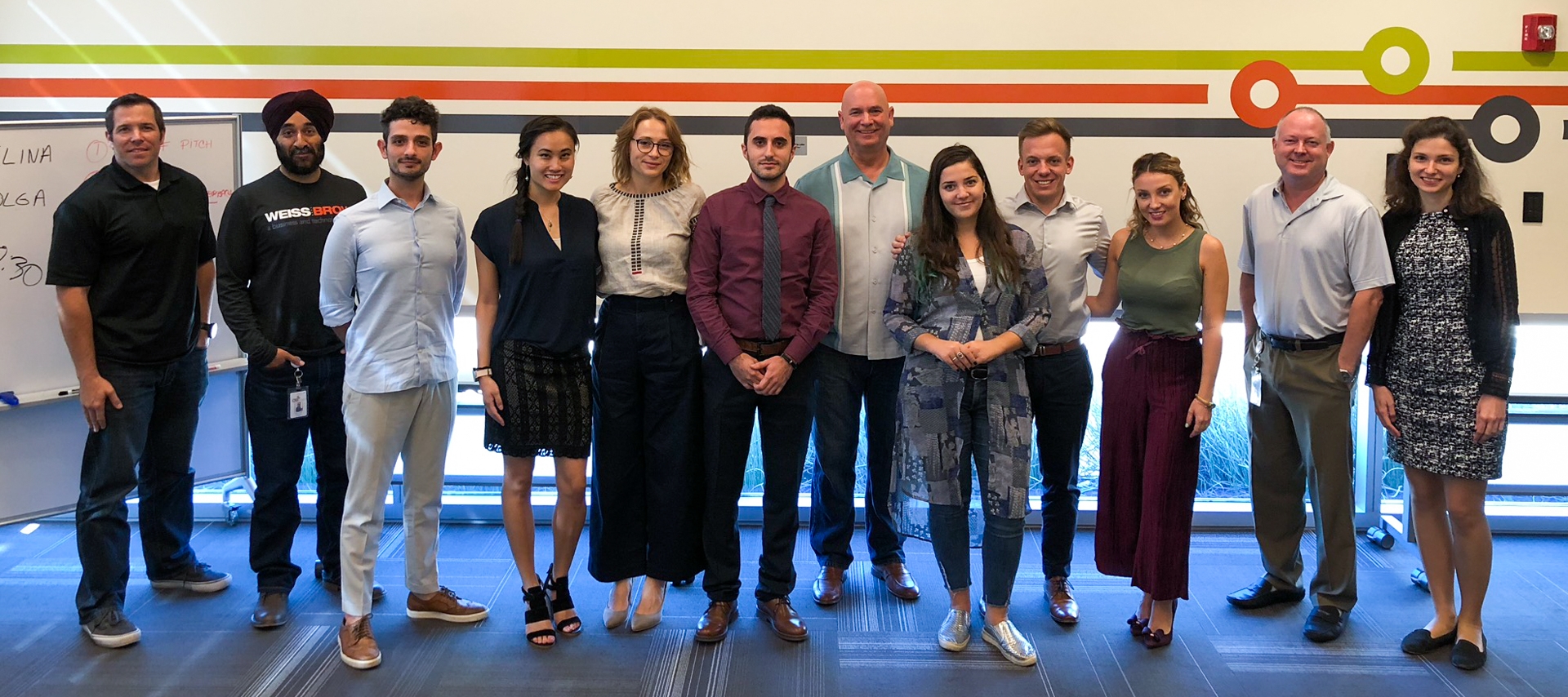 YTILI Fellows with their pitch competition judges (left to right): Mike Simons, Romi Dhillon, Stefano Santarelli, Jenny Poon, Olga Royenko, Lorik Mullaademi, Tom Schumann, Keti Gjipali, Miha Rajh, Dasha Runic, Russ Yelton, and Elina Naydenova.