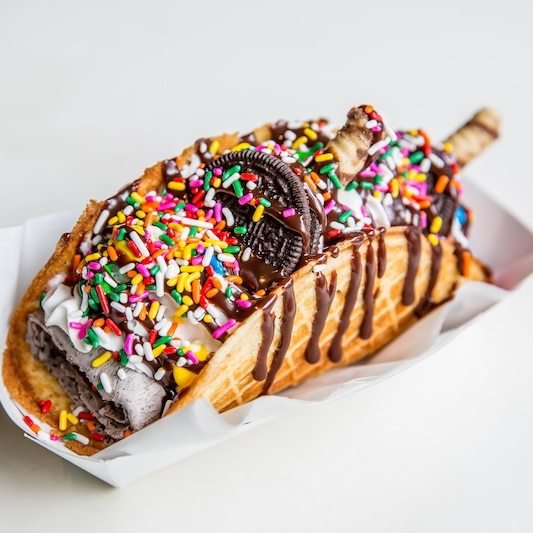 Happy Cinco de Mayo!  In celebration... why would you choose between ice cream and waffles when you can have both? Try our unique Waffle Taco, a delicious twist that combines your favorite flavors in a crunchy waffle cone! 🍦🌮 #WaffleTaco #Innovativ