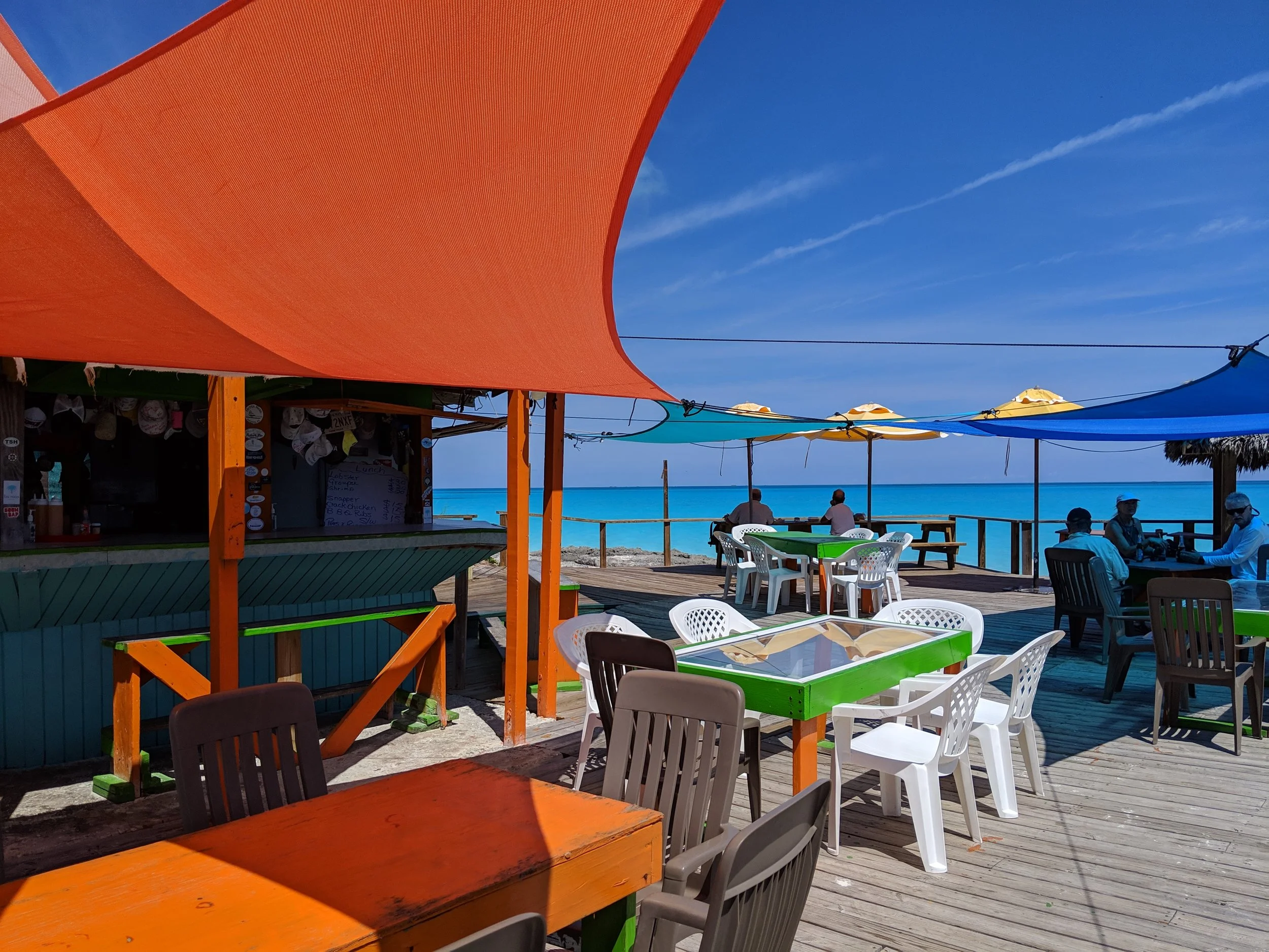 Having lobster at lunch spot on the beach