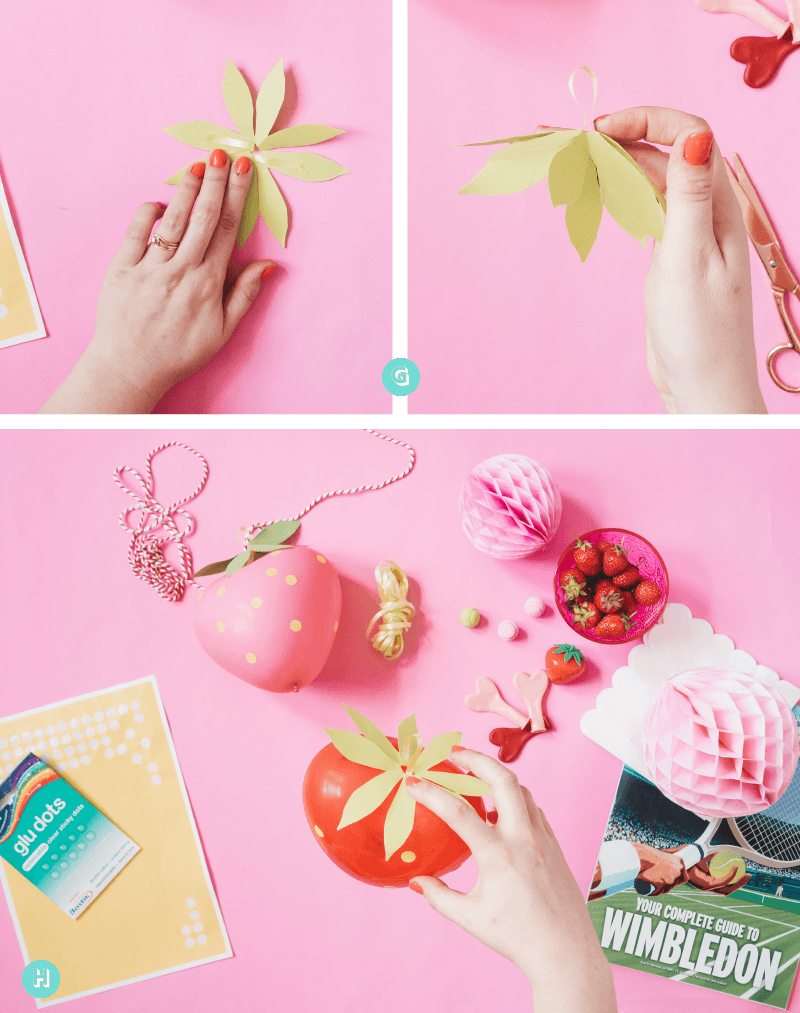 How to make a super cute strawberry balloon garland using heart shaped balloons from Hello Party