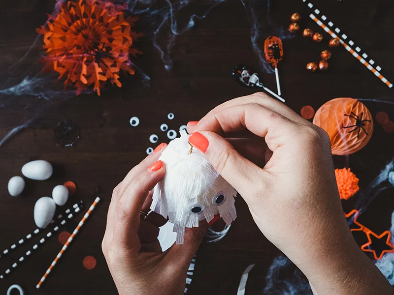 How to make a cute ghost halloween balloon tail - insert a brass screw eye into the top