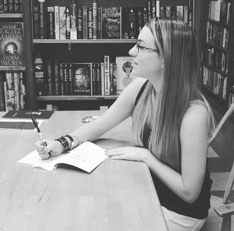 Signing copies of Basket Case: A Short (Short) Story Collection at the Basket Case Launch Party at the Book Revue in Huntington, NY on July 5, 2017.