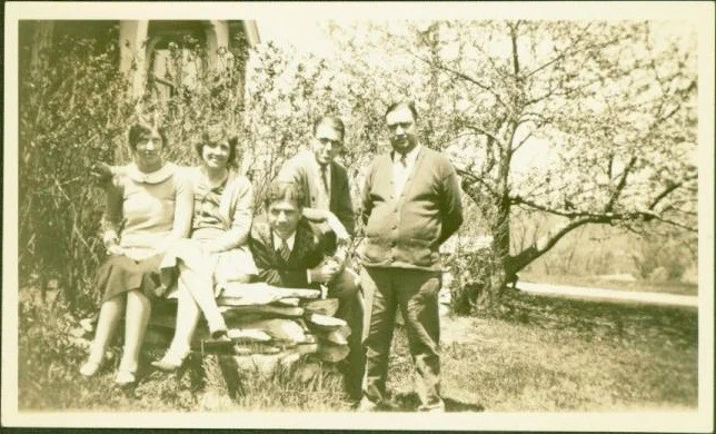 A group shot kept by Dr. Starbuck in a personal photo album shows gay and lesbian couples holding hands outside the Big House, Middlefield, MA, circa 1930. Photo Credit: Sexual Minorities Archives.