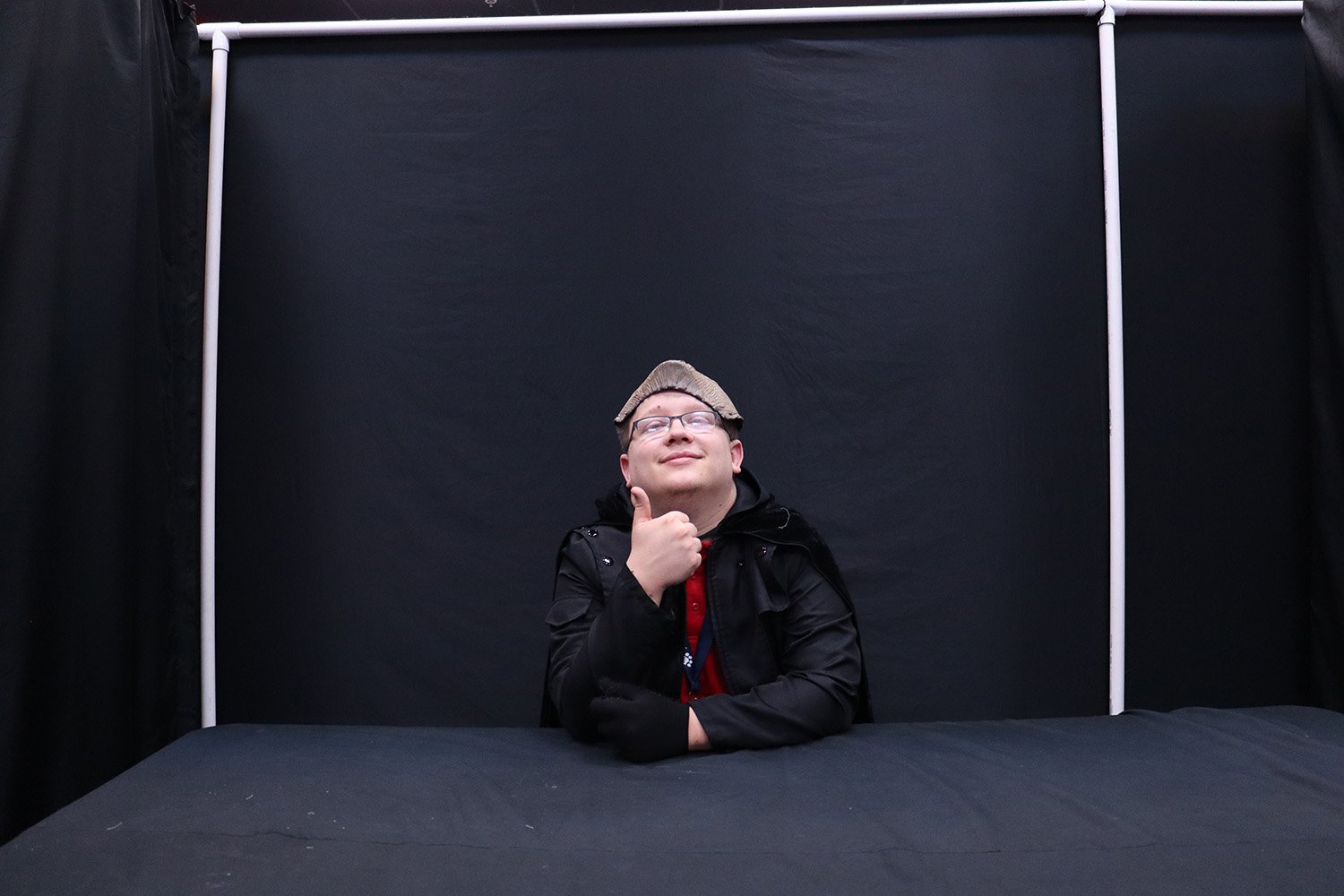 Actor Smiling At Camera with a Thumb's Up