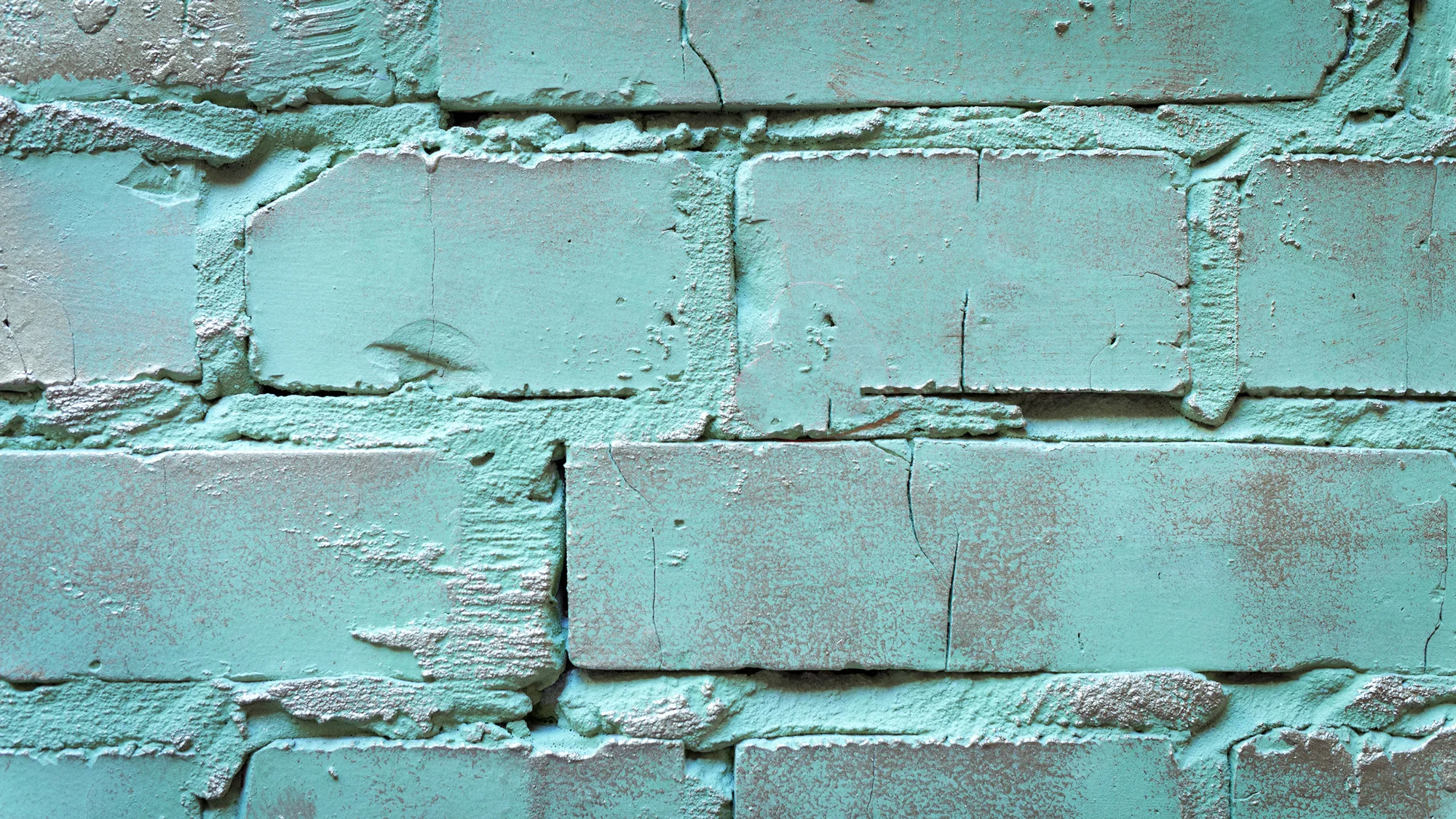 Painted Teal Brick Design Thought: Decorate with brick and paint it an accent color. Brick is a sustainable green building material made from natural ingredients. It creates minimal waste and has numerous recycling options. Brick is one of the few construction materials that can be reused in the building process.