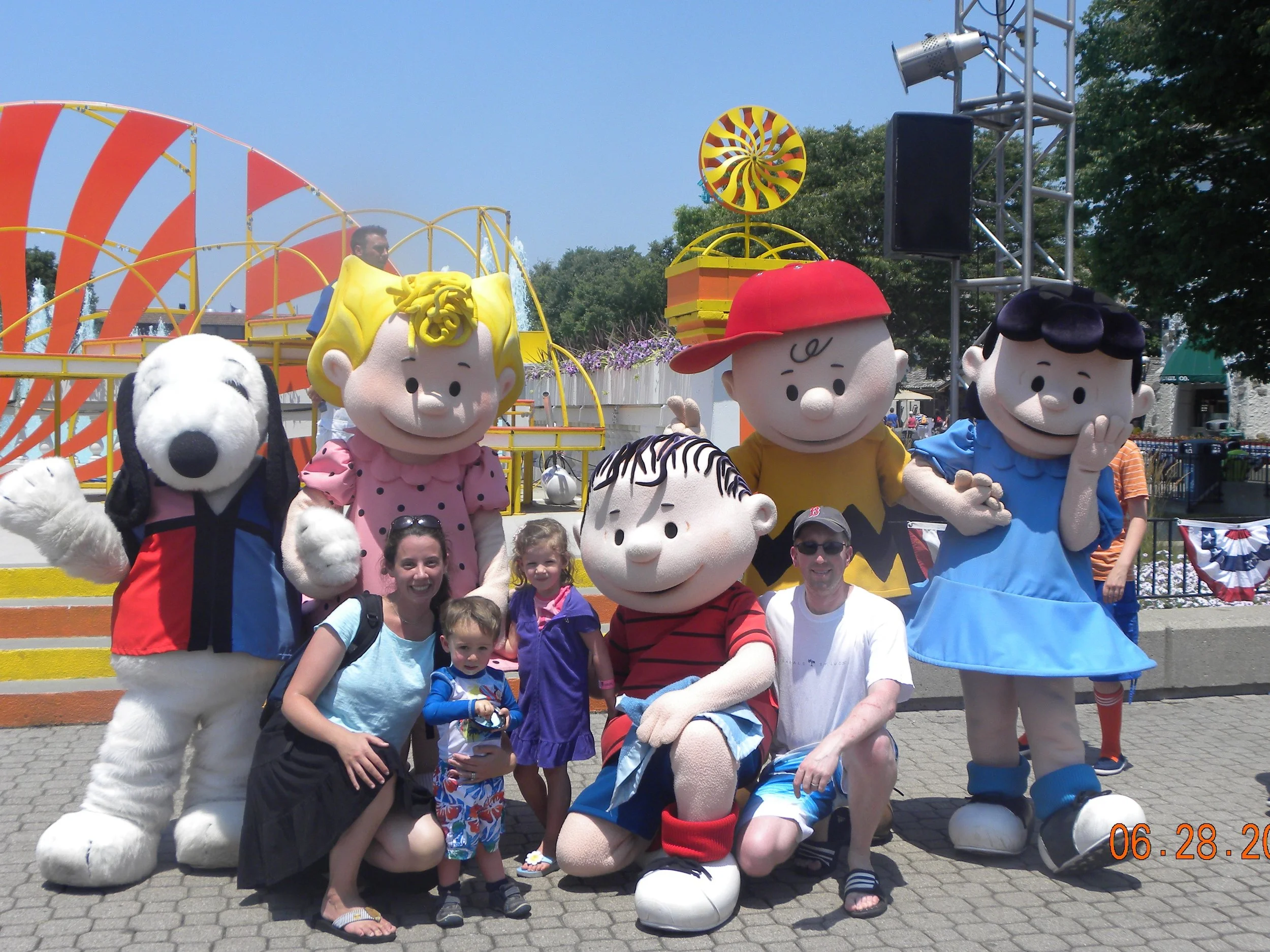 My family after a dance party with Snoopy and the gang at King's Island, outside Cincinnati, Ohio in 2012. This was one of the first stops on our first, big road trip.