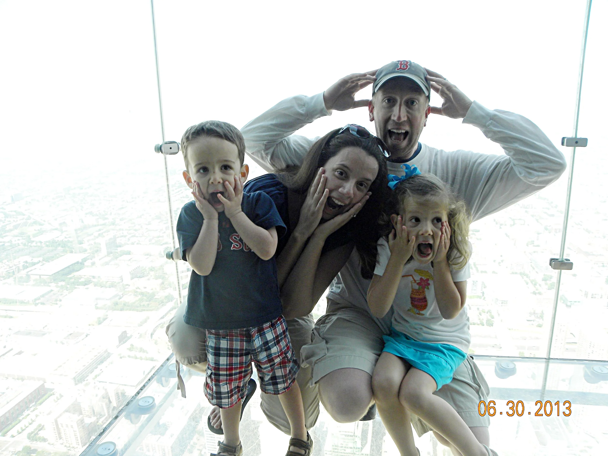 On the 103rd floor glass floor of the SkyDeck at Willis Tower, part of Chicago's CityPass.