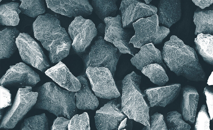 Scanning electron microscope (SEM) image of Himed’s proprietary MCD apatitic abrasive. Formulated to be as hard as possible (approximately 500 HV100) this bioresorbable abrasive presented a radical improvement over conventional alumina and silicon carbide methods for all manner of implant texturing.