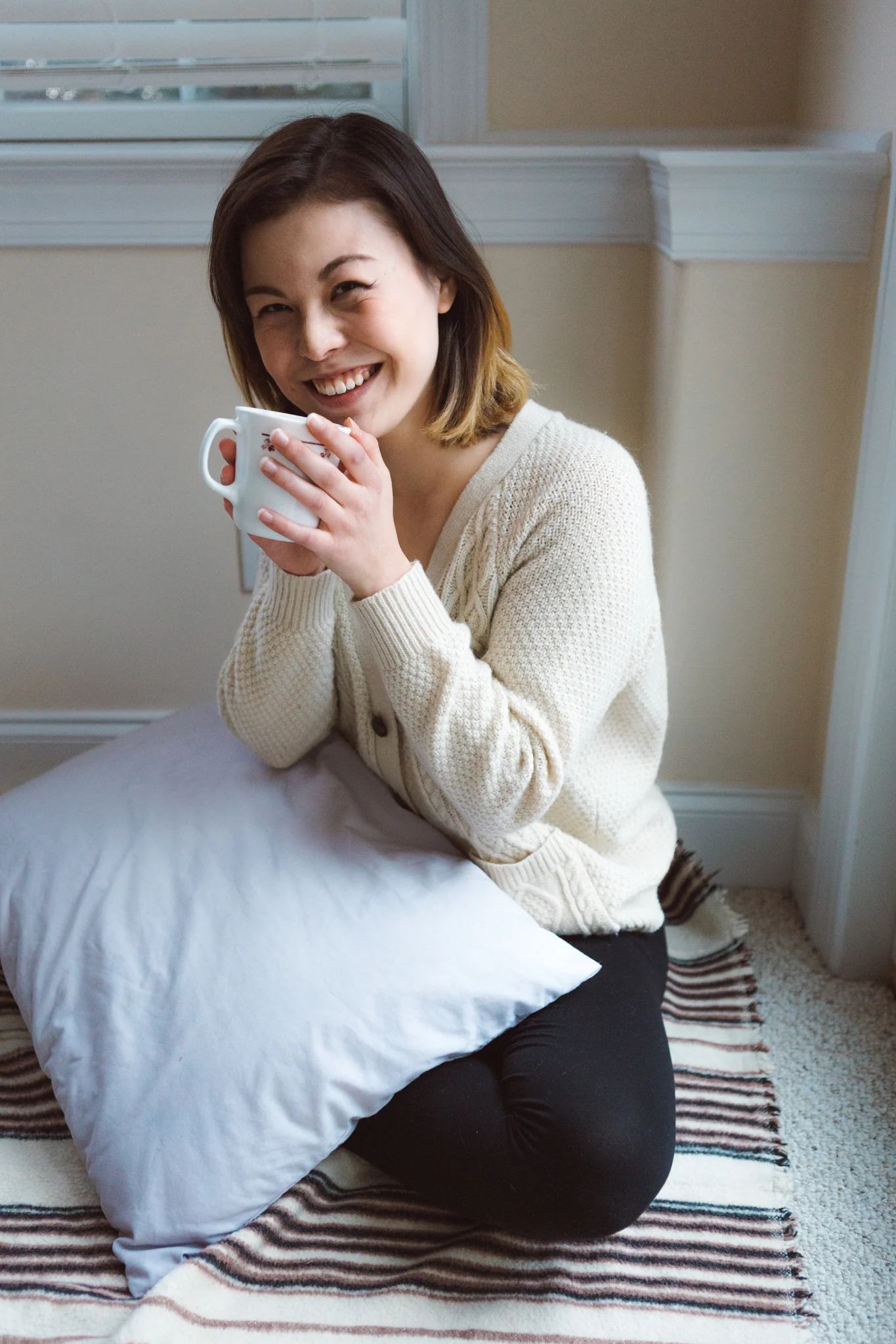 Pretending I've got a matcha latte in my cup. In reality, it was a cold cup of hot cocoa because I kept forgetting to drink it.