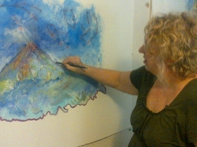  Sue working on a new painting for her first international solo exhibition. 