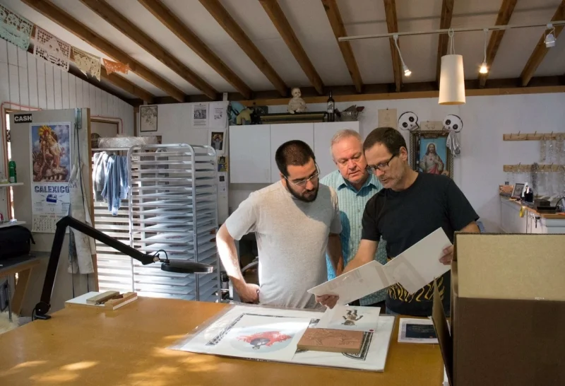  Felipe visiting with master printer Brent Bond, Santo Press, Scottsdale  11-17-14  Photo Credit Carolyn Lavender 