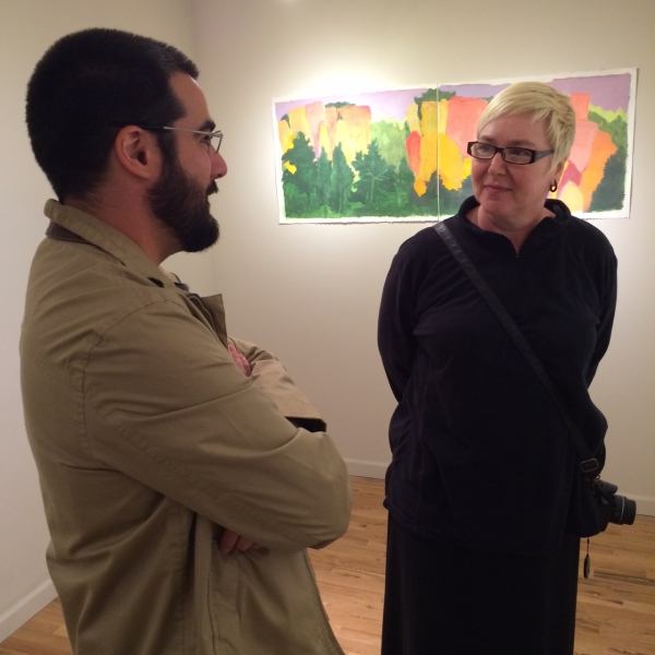  Felipe speaking with Cathryn Hugger at Opening, 11-21-14 