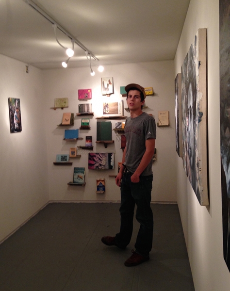  Ben Peck with his installed art exhibit, 2-19-15  Photo credit: Alexis Duque 