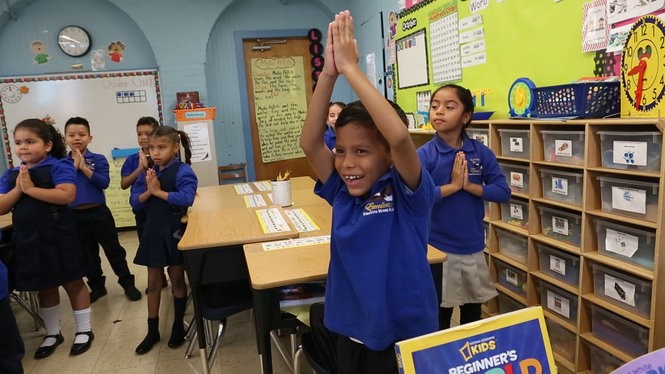 Yoga makes peace and quiet for Newark Kids' school day