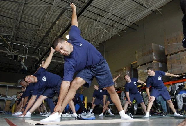 Firefighters build strength, de-stress with yoga workouts  