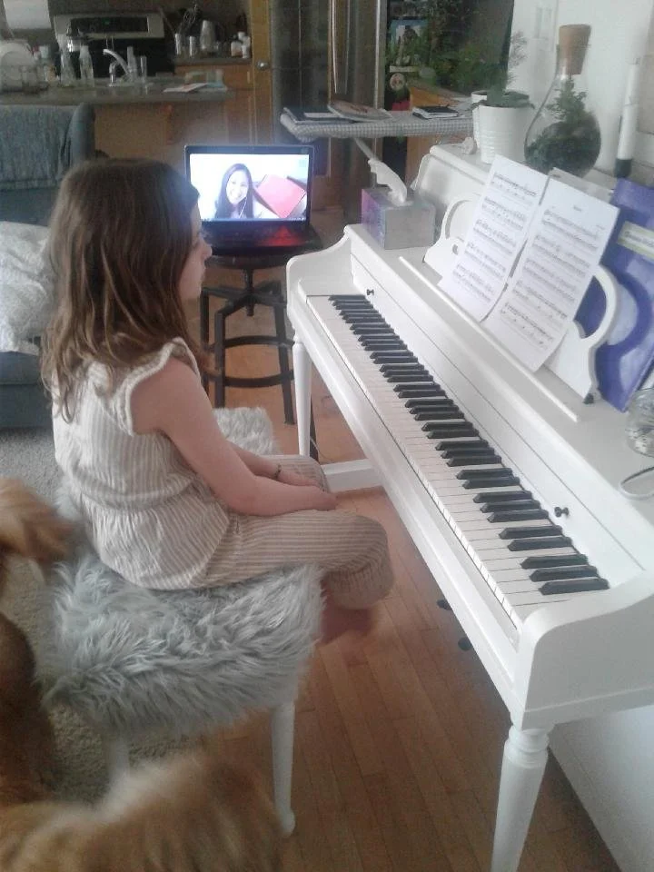 Student learning keyboard during a live online piano lesson with Volo Academy of Music