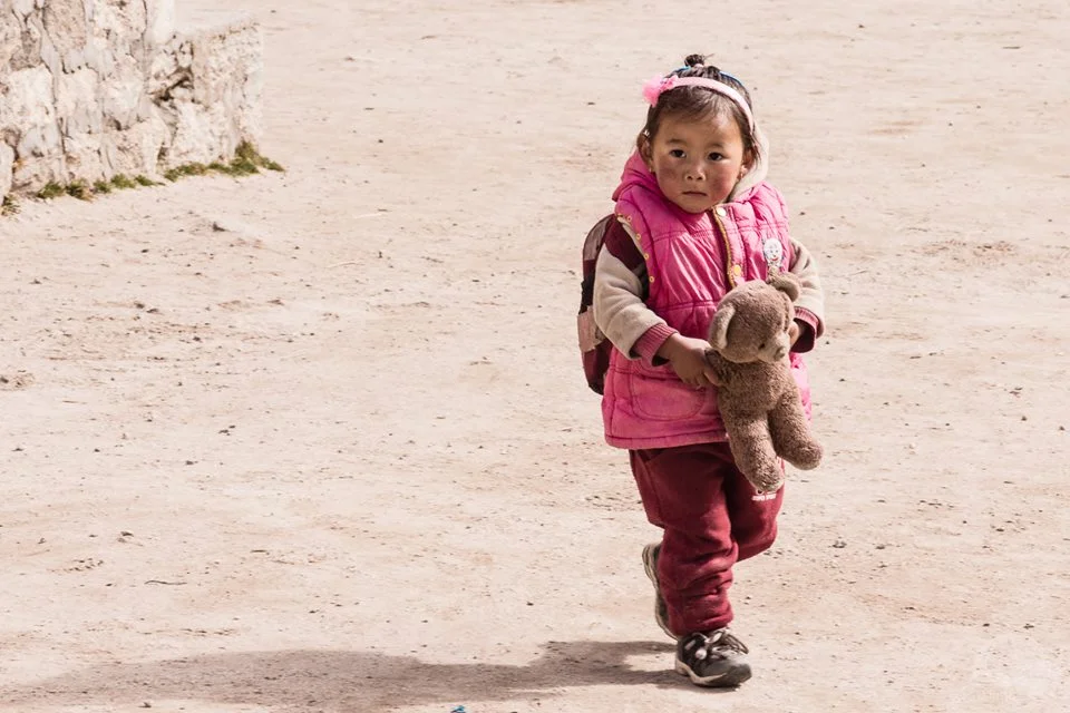 Little girl walking inside the Edmund Hillary school - Photo by Hoang Le Giang