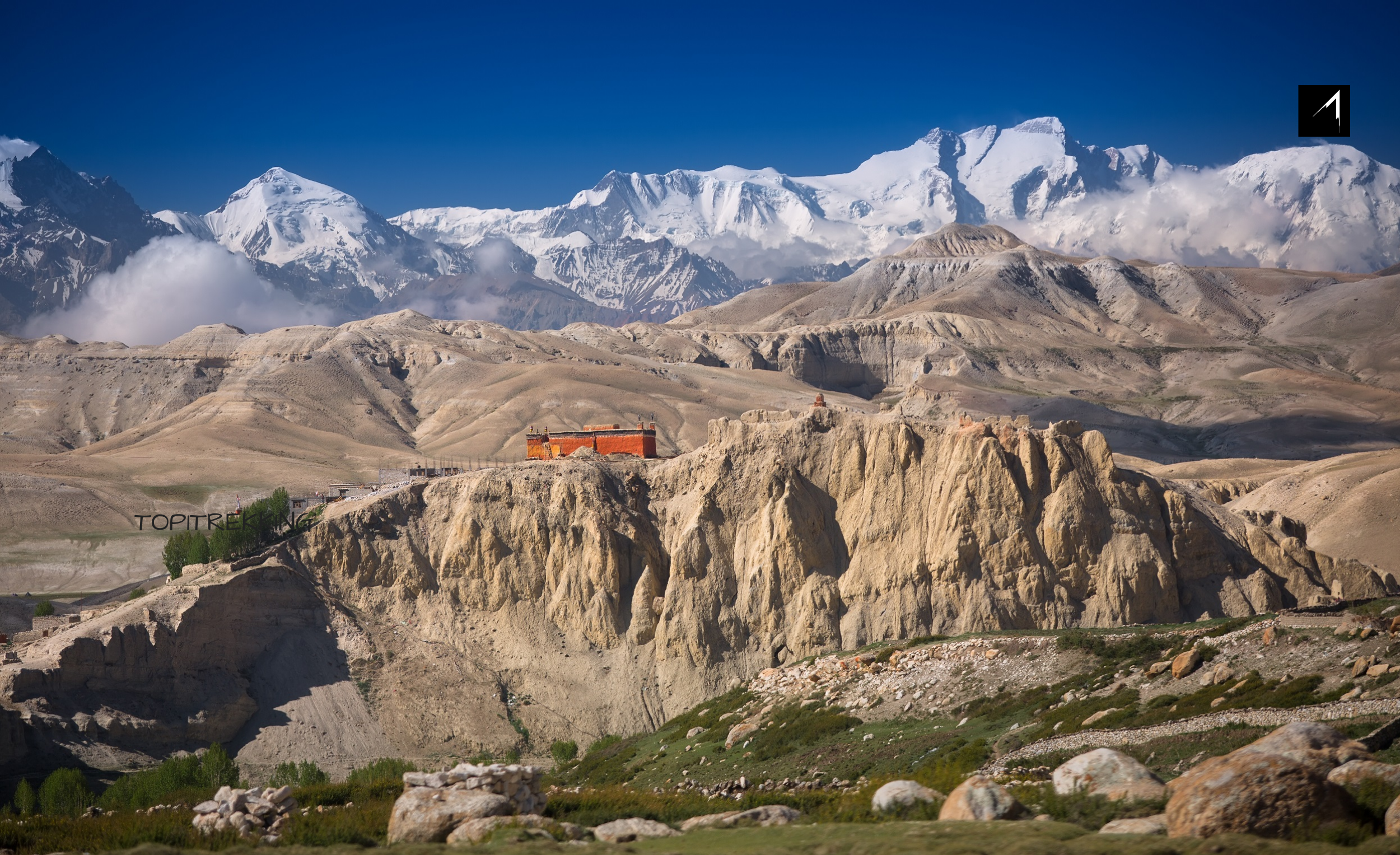 Gumpa sit on top of the hill with Himalaya in the backdrop