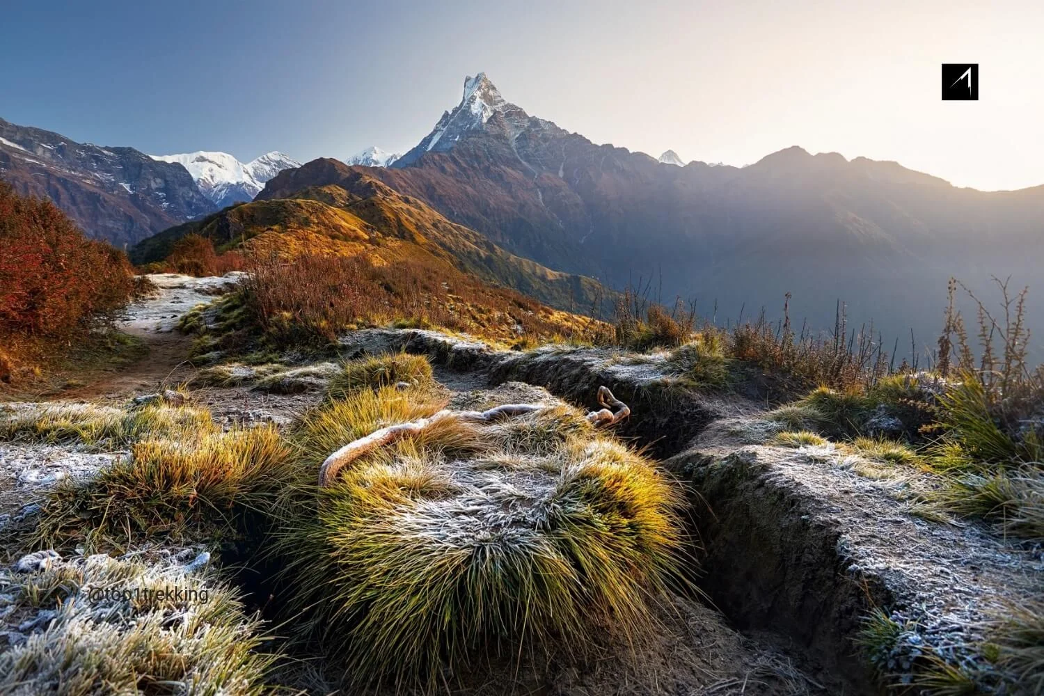 Trekkers on the way to Mardi Himal Base Camp with Impressive Mt. Machhapuchare just straight above
